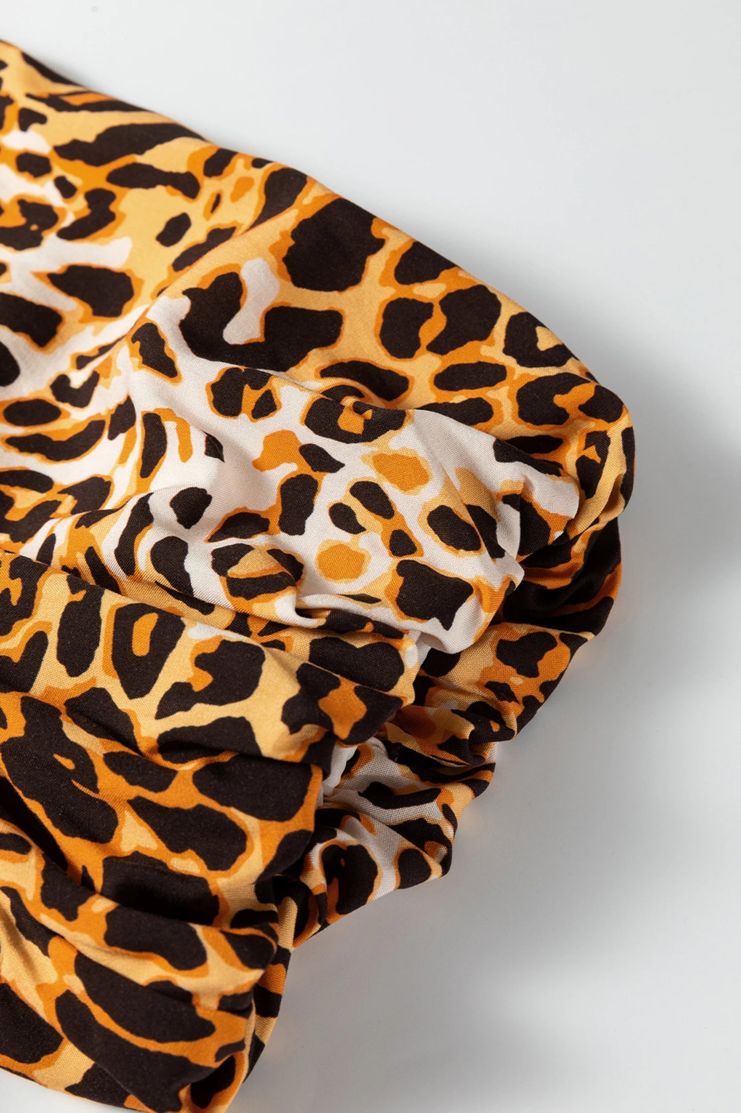 Leopard Print Short Puff Sleeve Slit Neck Babydoll Blouse