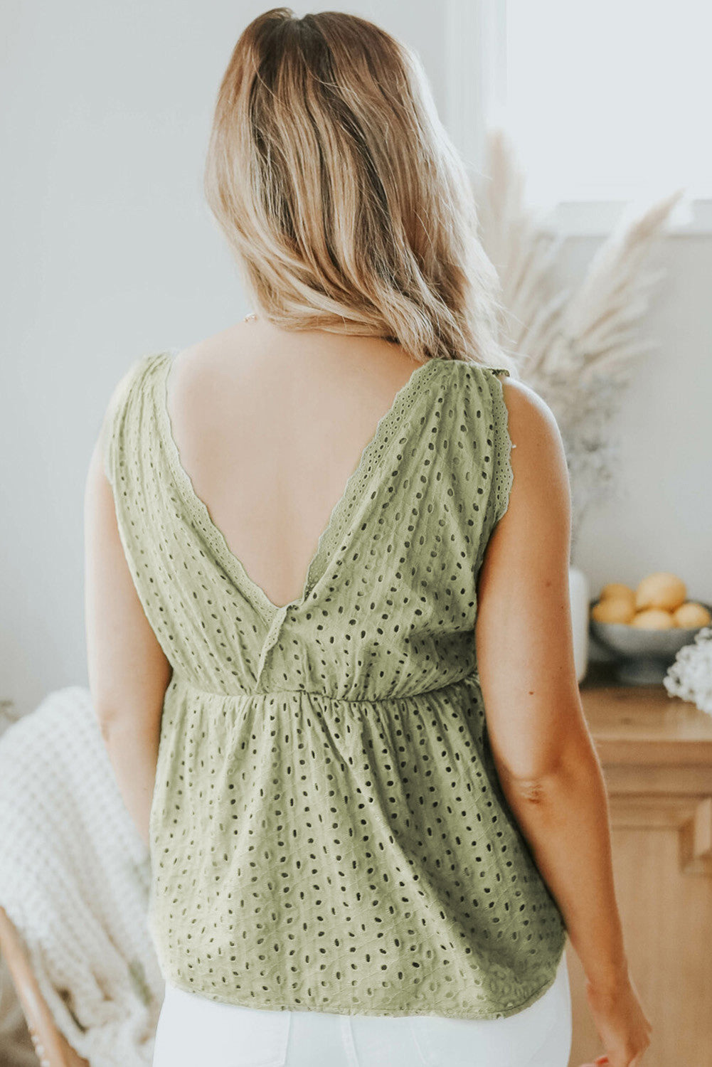 Green Sleeveless Eyelet Peplum Top